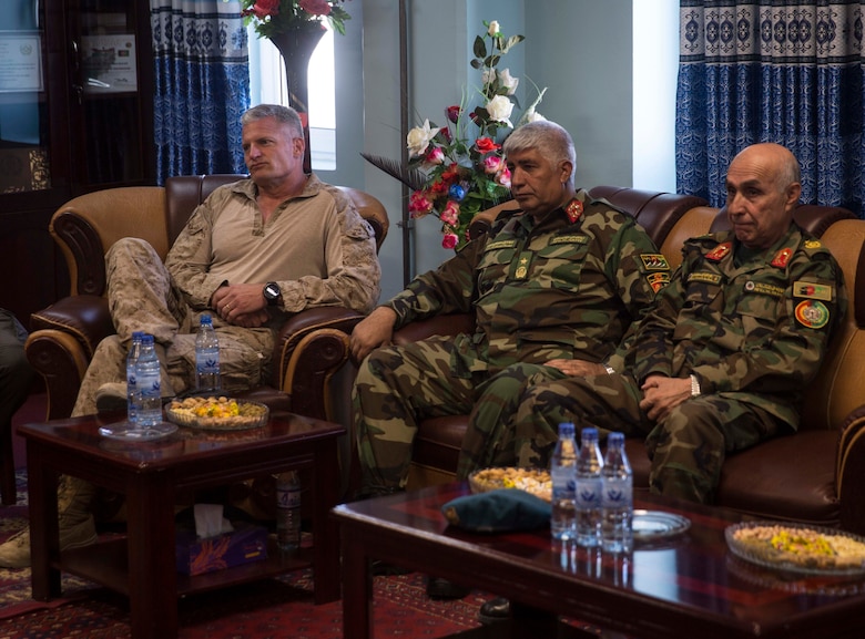 U.S. Marine Brig. Gen. Roger Turner, left, the commanding general of Task Force Southwest, and Afghan National Defense and Security Force key leaders meet to discuss Operation Maiwand Seven at Bost Airfield, Afghanistan, Oct. 15, 2017. The shura allowed Afghan and Task Force leadership to review the progress of the operation and discuss follow-on actions to ensure a successful mission in the clearing of the Nad Ali district. (U.S. Marine Corps photo by Sgt. Justin T. Updegraff)