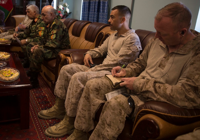 U.S. Marine advisors with Task Force Southwest and key leaders from the Afghan National Defense and Security Forces discuss recent progress and future actions of Operation Maiwand Seven at Bost Airfield, Afghanistan, Oct. 15, 2017. Maiwand Seven combines multiple elements of ANDSF, including the Afghan National Army 215th Corps, 505th Zone National Police and National Directorate of Security among others to thwart the Taliban from the Nad’Ali area in order to promote governance and enhance security for the local populace. (U.S. Marine Corps photo by Sgt. Justin T. Updegraff)