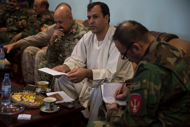 Afghan National Defense and Security Force key leaders discuss follow-on actions for Operation Maiwand Seven at Bost Airfield, Afghanistan, Oct. 15, 2017. U.S. Marines with Task Force Southwest are collaborating with their Afghan partners throughout the operation. Multiple elements of Helmand-based ANDSF are clearing the Nad’Ali district to remove Taliban insurgents, promoting stability and security for the local populace as a result. (U.S. Marine Corps photo by Sgt. Justin T. Updegraff)