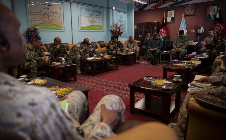 U.S. Marines with Task Force Southwest and Afghan National Defense and Security Force key leaders discuss follow-on actions for operation Maiwand Seven at Bost Airfield, Afghanistan, Oct. 21, 2017. Through the combined efforts of ANDSF with assistance from the Task Force, Maiwand Seven has thus far cleared multiple pockets of Taliban insurgency in the Nad’Ali district, helping to promote stability and security for local residents. (U.S. Marine Corps photo by Sgt. Justin T. Updegraff)