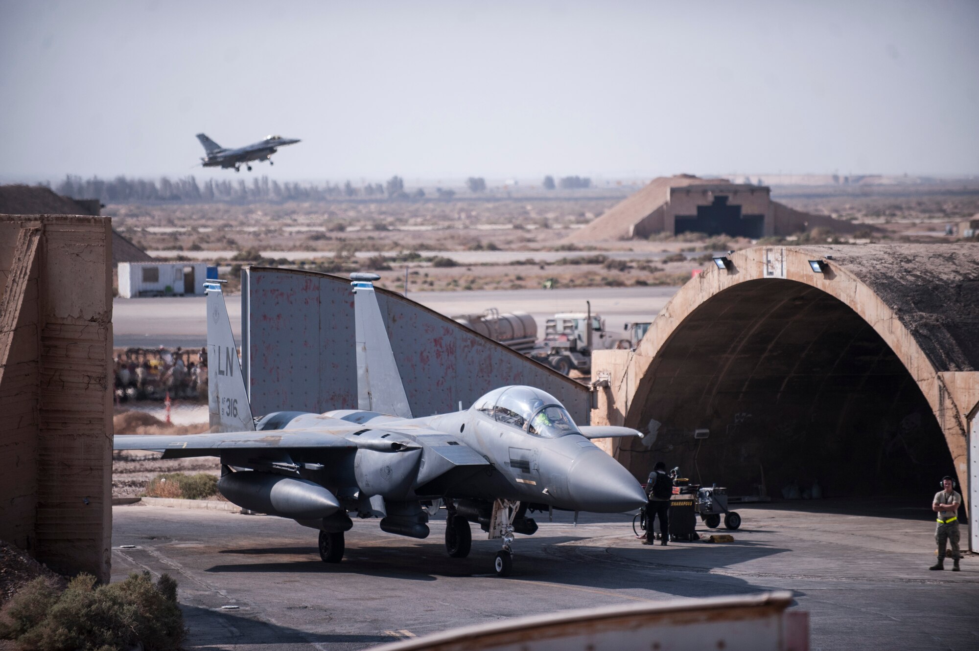 An F-15E Strike Eagle from the 492nd Expeditionary Fighter Squadron is prepared by maintainers assigned to the 332nd Expeditionary Maintenance Squadron prior to takeoff October 9, 2017 in Southwest Asia. During their deployment, the 492nd EFS performed precision ground attacks on Islamic State fighters, equipment, and economic assets, playing a crucial role in the liberation of major cities such as Mosul, Iraq.