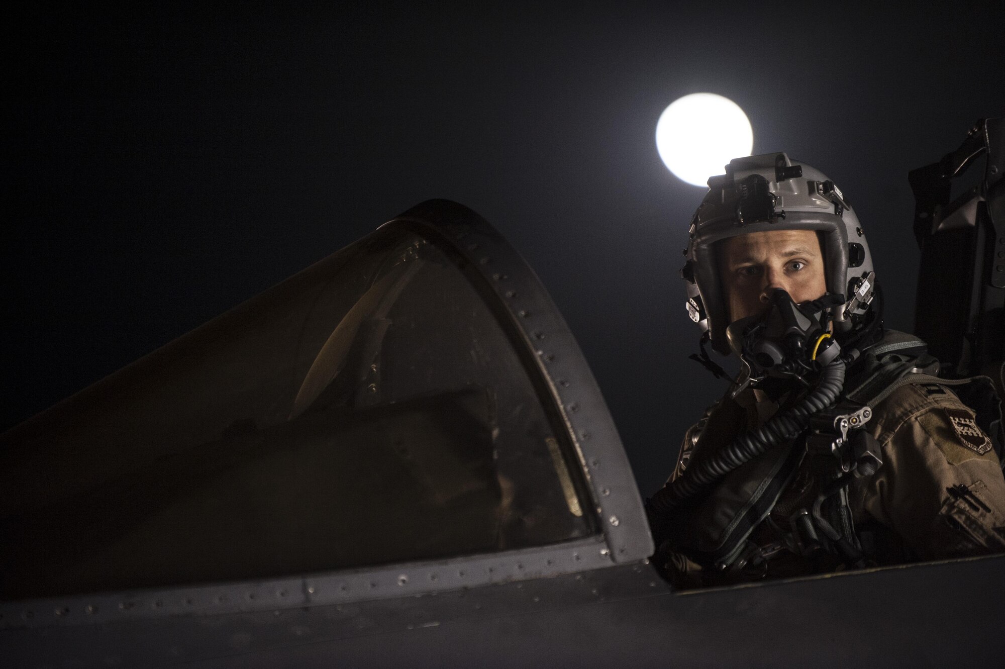 A pilot assigned to the 492nd Expeditionary Fighter Squadron readies his F-15E Strike Eagle for an early-morning takeoff October 4, 2017, at an undisclosed location in Southwest Asia. The 492nd EFS flew thousands of sorties night and day for the last six months, providing close-air support for Coalition ground forces and striking Islamic State forces in the region.
