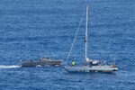 PACIFIC OCEAN (Oct. 25, 2017) Sailors assigned to the amphibious dock landing ship USS Ashland (LSD 48) maneuver the landing craft personnel (large) to render assistance to distressed mariners. . Ashland, operating in the Indo-Asia-Pacific region on a routine deployment, rescued two American mariners who had been in distress for several months after their sailboat had a motor failure and had strayed well off its original course while traversing the Pacific Ocean.