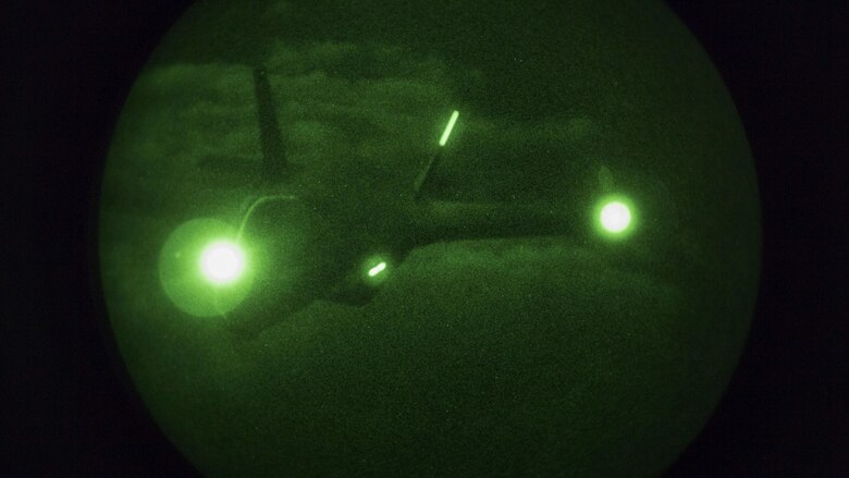 VMGR-152 conducts nighttime aerial refueling with VMFA-121, VMFA-251