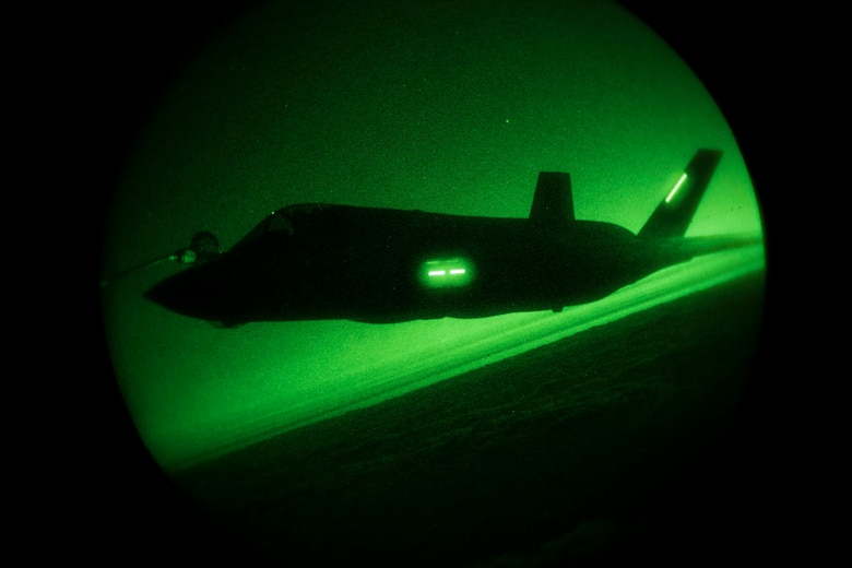 VMGR-152 conducts nighttime aerial refueling with VMFA-121, VMFA-251