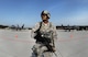 U.S. Air Force Tech. Sgt. Paul White, 633rd Security Forces Squadron flight chief, stands guard of F-22 Raptors from the 1st Fighter Wing, Joint Base Langley-Eustis, Va., Oct. 17, 2017, at Powidz Air Base, Poland. This forward deployment is an opportunity for the F-22s to train alongside U.S. and allied air force aircraft in a realistic training environment. (U.S. Air Force photo by Senior Airman Tenley Long)