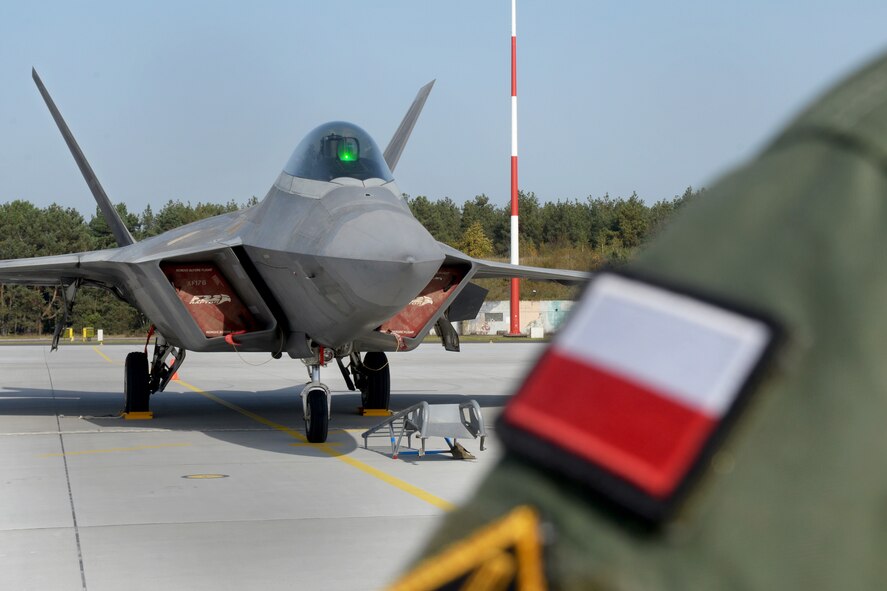 An F-22 Raptor from the 1st Fighter Wing, Joint Base Langley-Eustis, Va., sits on the flightline Oct. 17, 2017, at Powidz Air Base, Poland. This forward deployment is an opportunity for the F-22s to maximize training opportunities, demonstrate the U.S. Air Force’s steadfast commitment to NATO allies and deter any actions that destabilize regional security. (U.S. Air Force photo by Senior Airman Tenley Long)