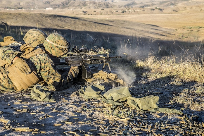 U.S. Marines with 1st Law Enforcement Battalion, I Marine Information Group, engage targets with the M249 squad automatic weapon during a live fire training exercise on Camp Pendleton, Calif., Oct. 24, 2017. The importance of this exercise was to prepare the Marines for their upcoming deployment with the 13th Marine Expeditionary Unit.