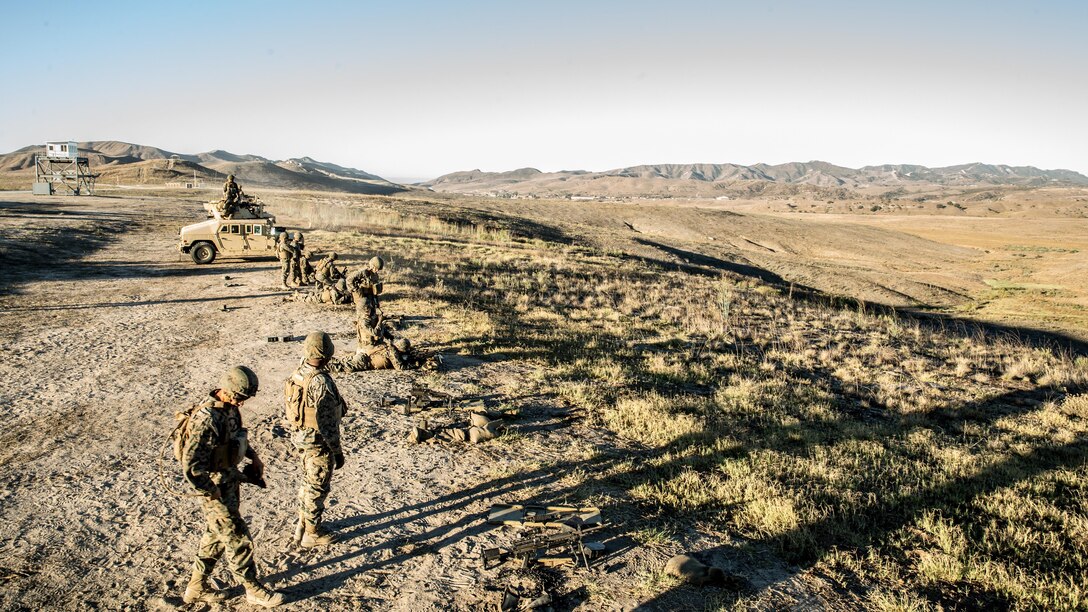U.S. Marines with 1st Law Enforcement Battalion, I Marine Information Group, engage targets with the M249 squad automatic weapons during a live fire training exercise at range 407C on Camp Pendleton, Calif., Oct. 24, 2017. The importance of this exercise was to prepare the Marines for their upcoming deployment with the 13th Marine Expeditionary Unit.