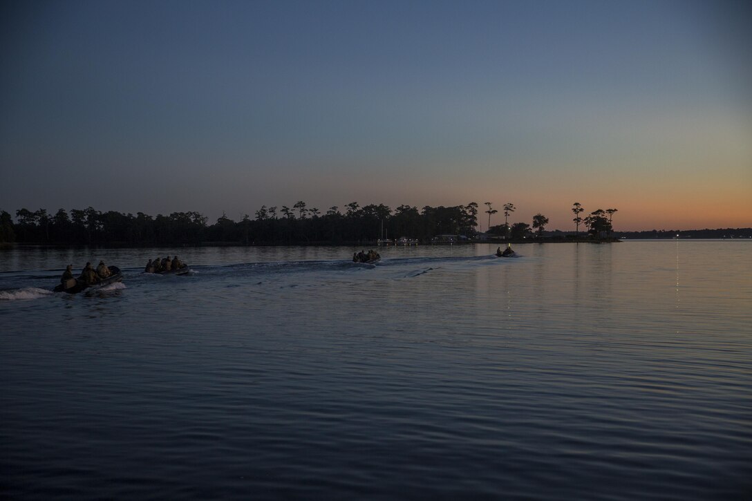 Royal Marines make their way to their first infiltration point for a ground insertion operation during Bold Alligator 17 at Marine Corps Base Camp Lejeune, Oct. 20, 2017. Bold Alligator 17 is a training exercise focused on a regimental amphibious assault that allows the Navy and Marine Corps team to train with partner nations to refine and strengthen core amphibious competencies critical to maritime power projection.