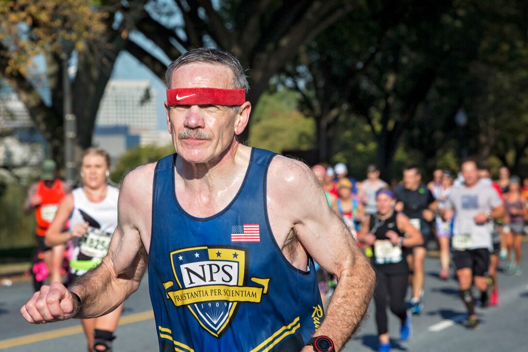 A man runs the course in the Marine Corps Marathon.