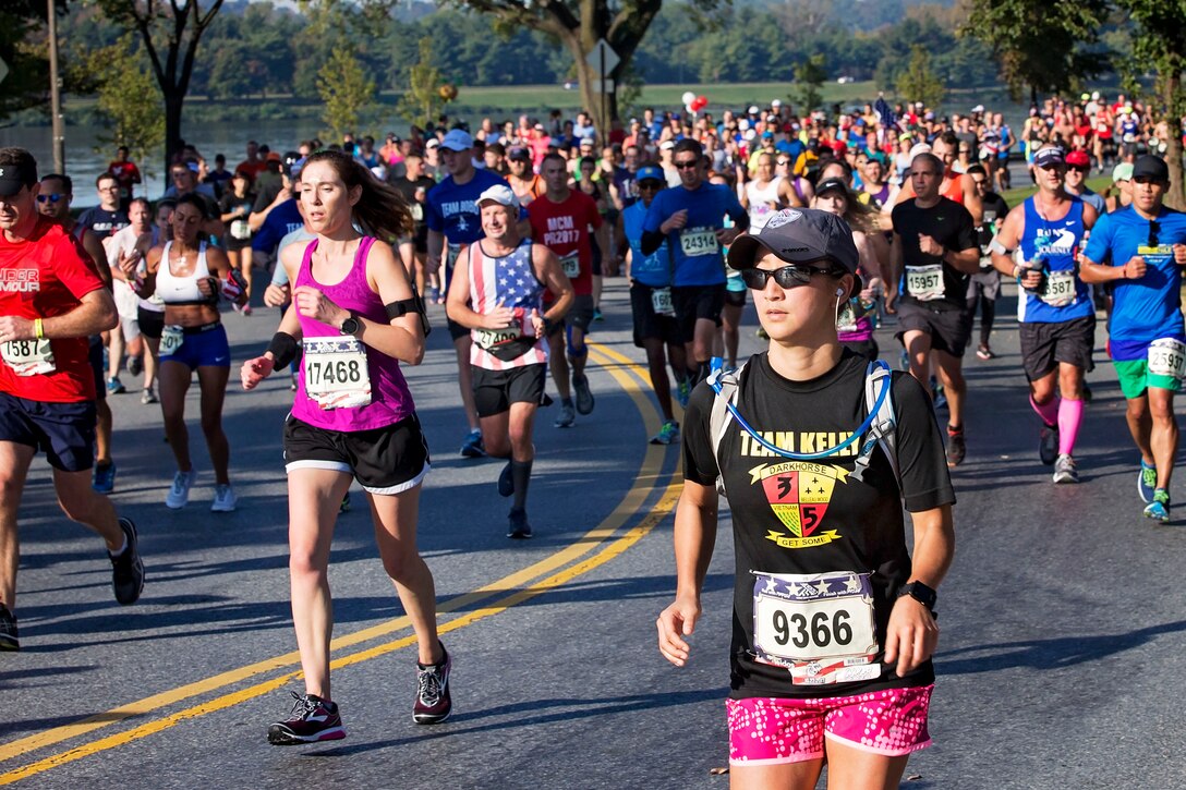 Participants run in the Marine Corps Marathon.