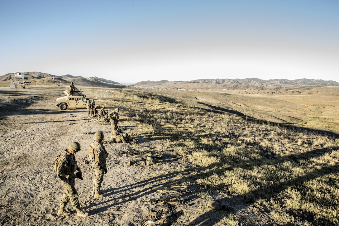 U.S. Marines with 1st Law Enforcement Battalion, I Marine Information Group, engage targets with the M249 squad automatic weapons during a live fire training exercise at range 407C on Camp Pendleton, Calif., Oct. 24, 2017. The importance of this exercise was to prepare the Marines for their upcoming deployment with the 13th Marine Expeditionary Unit. (U.S. Marine Corps photo by LCpl Anabel Abreu Rodriguez)