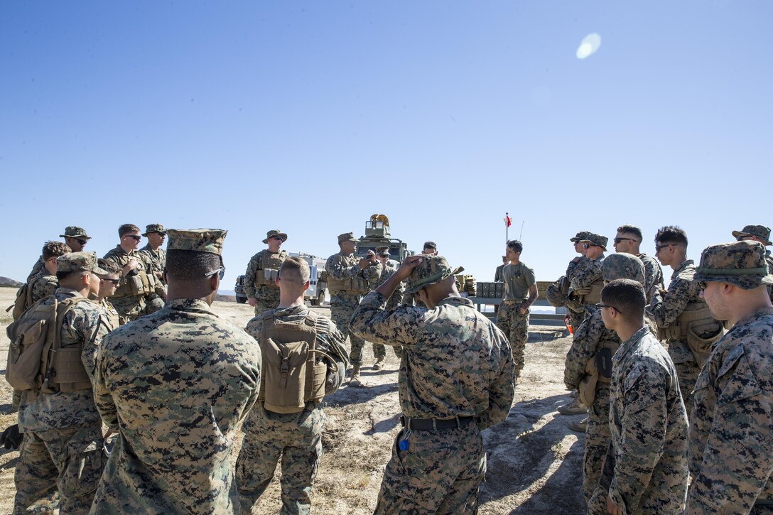U.S. Marines with 1st Law Enforcement Battalion, I Marine Information Group, receive a safety brief before conducting a live fire machine gun training exercise on Camp Pendleton, Calif., Oct. 24, 2017. The importance of this exercise was to prepare the Marines for their upcoming deployment with the 13th Marine Expeditionary Unit. (U.S. Marine Corps photo by LCpl Anabel Abreu Rodriguez)