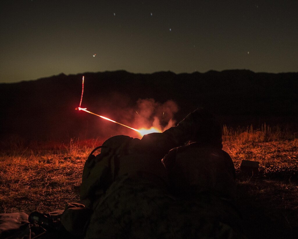 U.S. Marines with 1st Law Enforcement Battalion, I Marine Information Group, fire a M240B machine gun during a night live fire training exercise on Camp Pendleton, Calif., Oct. 24, 2017.The importance of this exercise was to prepare the Marines for their upcoming deployment with the 13th Marine Expeditionary Unit. (U.S. Marine Corps photo by LCpl Anabel Abreu Rodriguez)