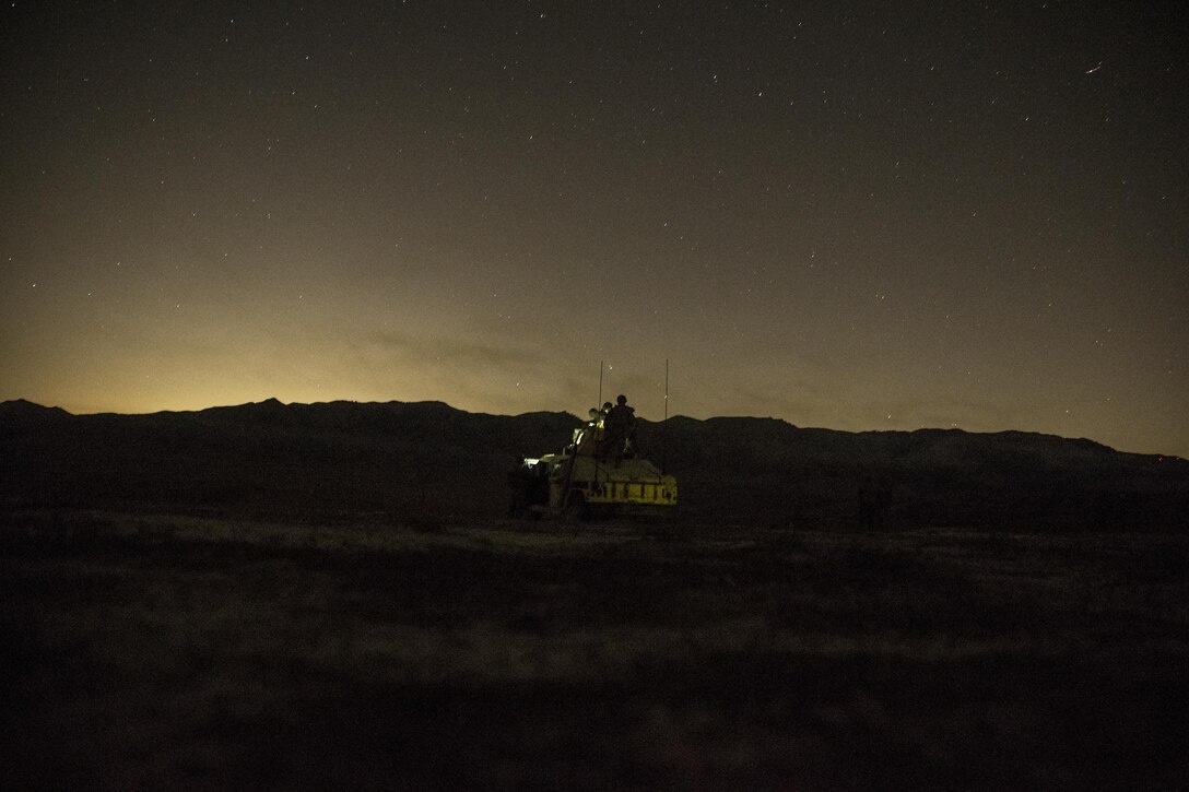U.S. Marines with 1st Law Enforcement Battalion, I Marine Information Group, inspect an M2 Browning .50 caliber machine gun during a training exercise on Camp Pendleton, Calif., Oct. 24, 2017.The importance of this exercise was to prepare the Marines for their upcoming deployment with the 13th Marine Expeditionary Unit. (U.S. Marine Corps photo by LCpl Anabel Abreu Rodriguez)