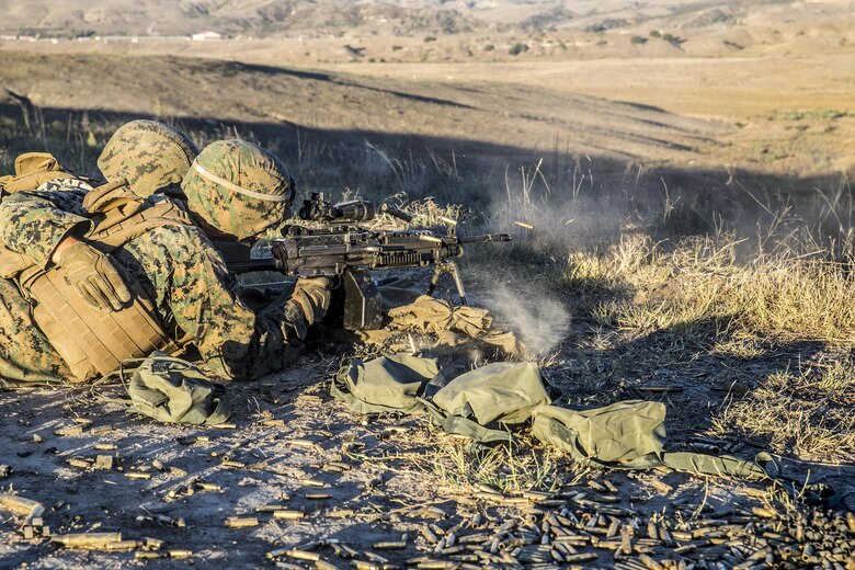U.S. Marines with 1st Law Enforcement Battalion, I Marine Information Group, engage targets with the M249 squad automatic weapon during a live fire training exercise on Camp Pendleton, Calif., Oct. 24, 2017. The importance of this exercise was to prepare the Marines for their upcoming deployment with the 13th Marine Expeditionary Unit. (U.S. Marine Corps photo by LCpl Anabel Abreu Rodriguez)