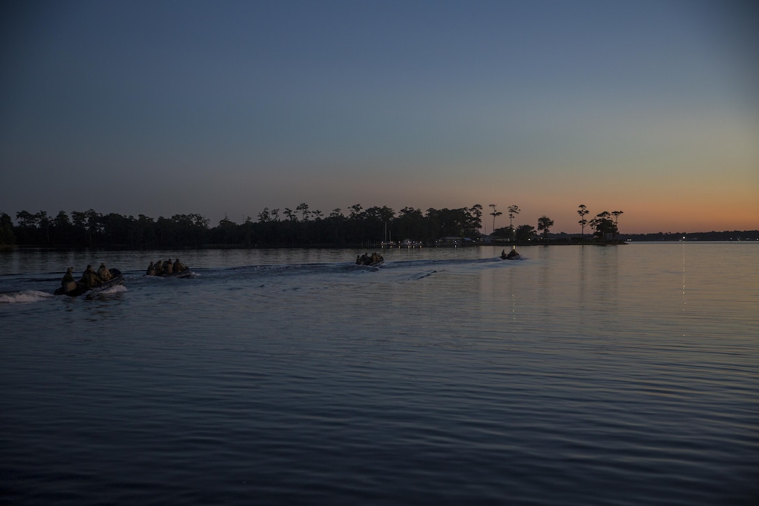 Royal Marines make their way to their first infiltration point for a ground insertion operation during Bold Alligator 17 at Marine Corps Base Camp Lejeune, Oct. 20, 2017. Bold Alligator 17 is a training exercise focused on a regimental amphibious assault that allows the Navy and Marine Corps team to train with partner nations to refine and strengthen core amphibious competencies critical to maritime power projection.