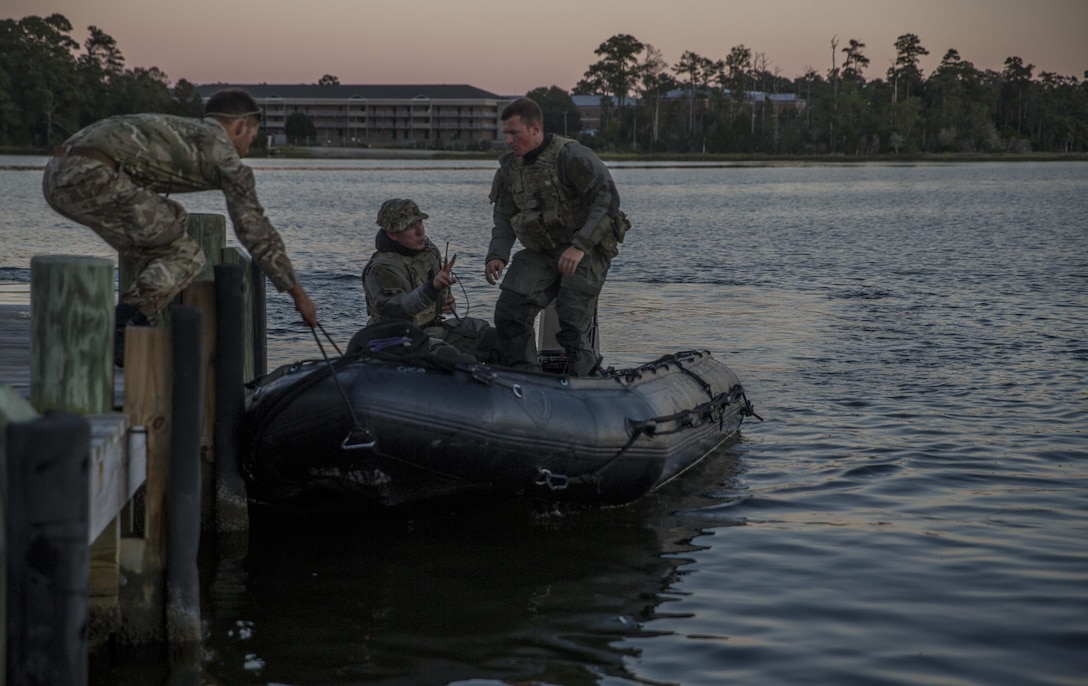 Royal Marines dock a Zodiac Combat Rubber Raiding Craft during Bold Alligator 17 at Marine Corps Base Camp Lejeune, Oct. 20, 2017. Bold Alligator 17 is a training exercise focused on a regimental amphibious assault that allows the Navy and Marine Corps team to train with partner nations to refine and strengthen core amphibious competencies critical to maritime power projection.