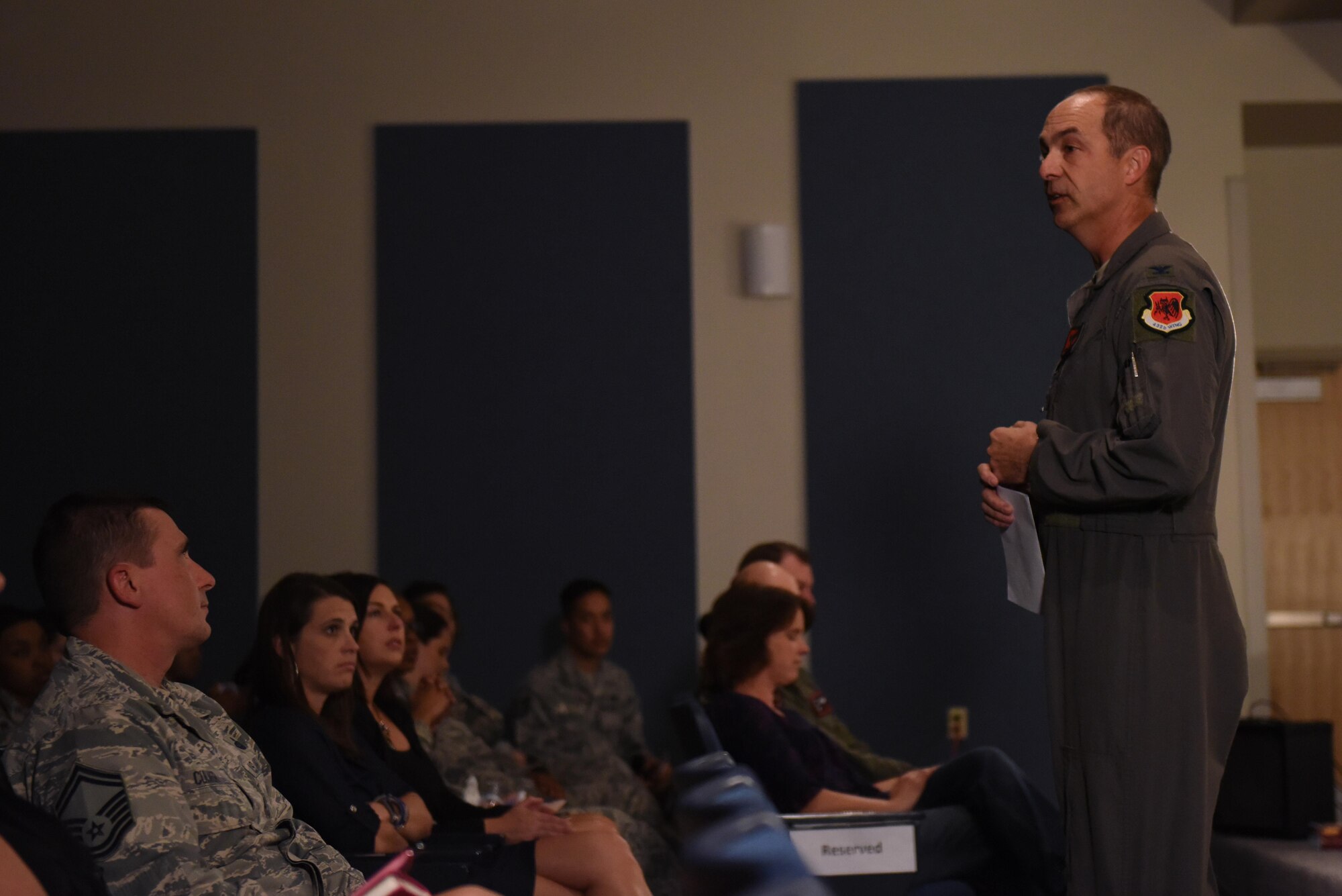 Col. David Bissonnette, 432nd Wing/432nd Air Expeditionary Wing vice commander, addressed the members who attended Storytellers and gave closing remarks in the Creech auditorium, October 18, 2017. Bissonnette expressed that he, as well as many in the audience, could relate to what some of the speakers experienced and thanked everyone who participated in this event. (U.S. Air Force photo/Airman 1st Class Haley Stevens)