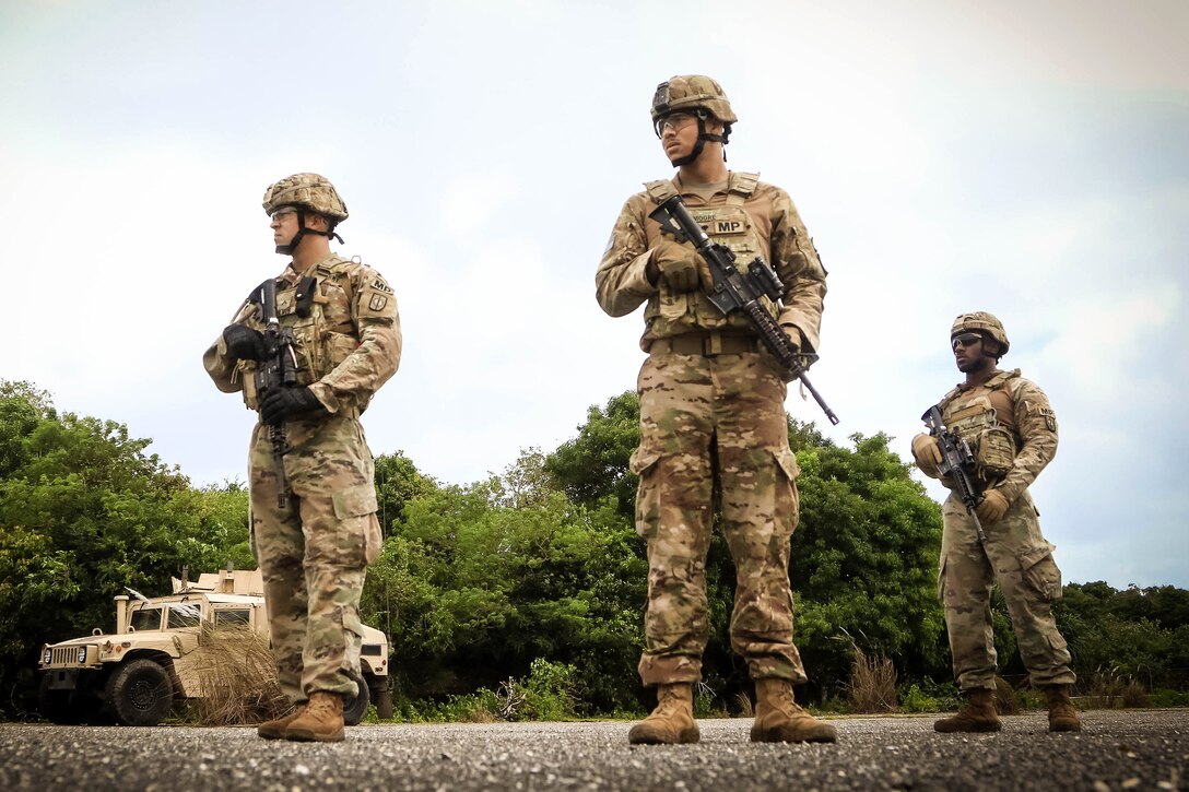 Soldiers conduct a rehearsal of concept drill before participating in a vehicle mounted patrol training exercise.
