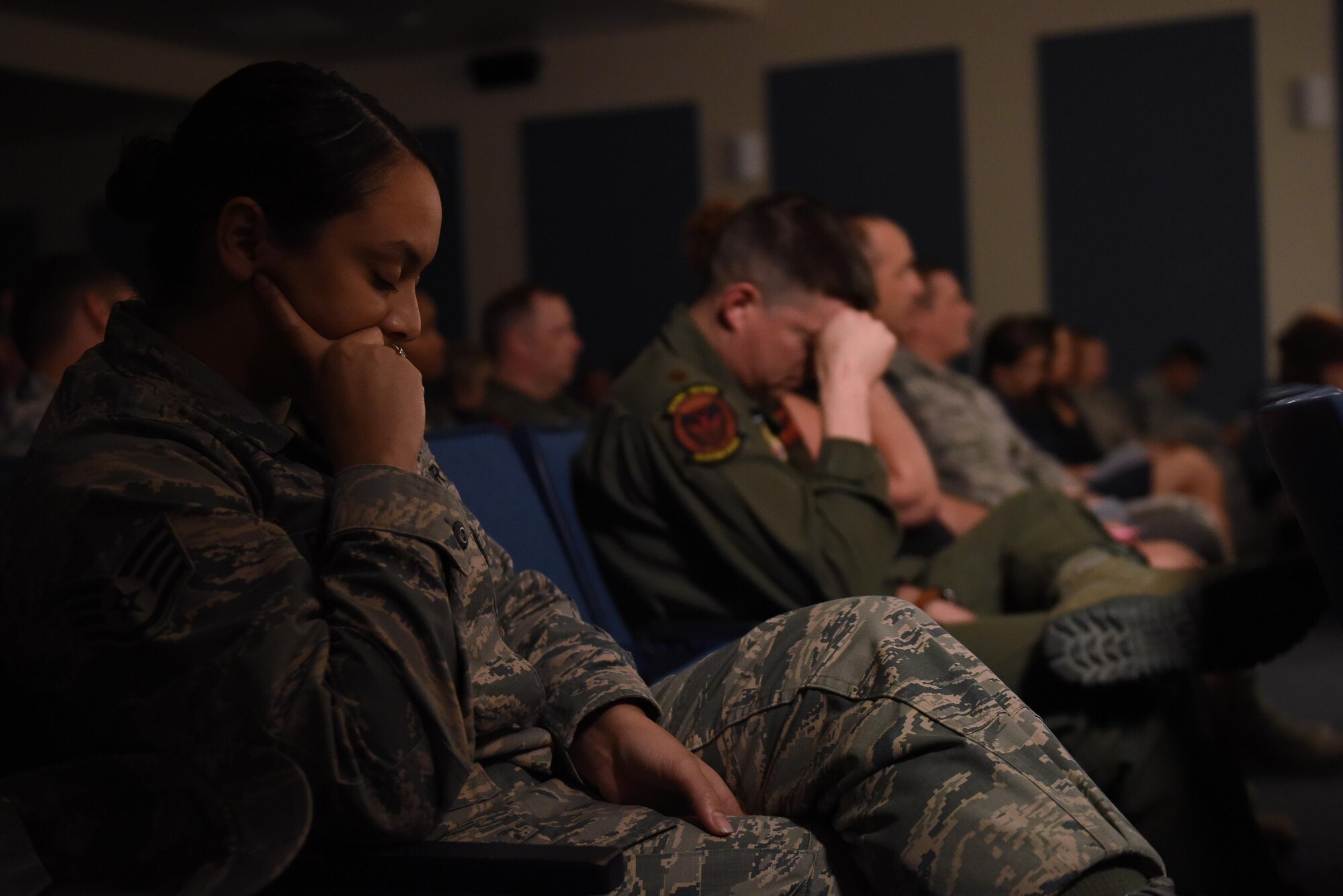 Tech. Sgt. Adam, 66th Rescue Squadron special missions aviator, asked audience members to close their eyes and allow themselves to experience his story as realistically as possible during a Storytellers event in the Creech auditorium, October 18, 2017. Adam began by describing what he could see, then moved to what he felt and finally shouted to the crowd the chaos that occurred over his headset. (U.S. Air Force photo/Airman 1st Class Haley Stevens)