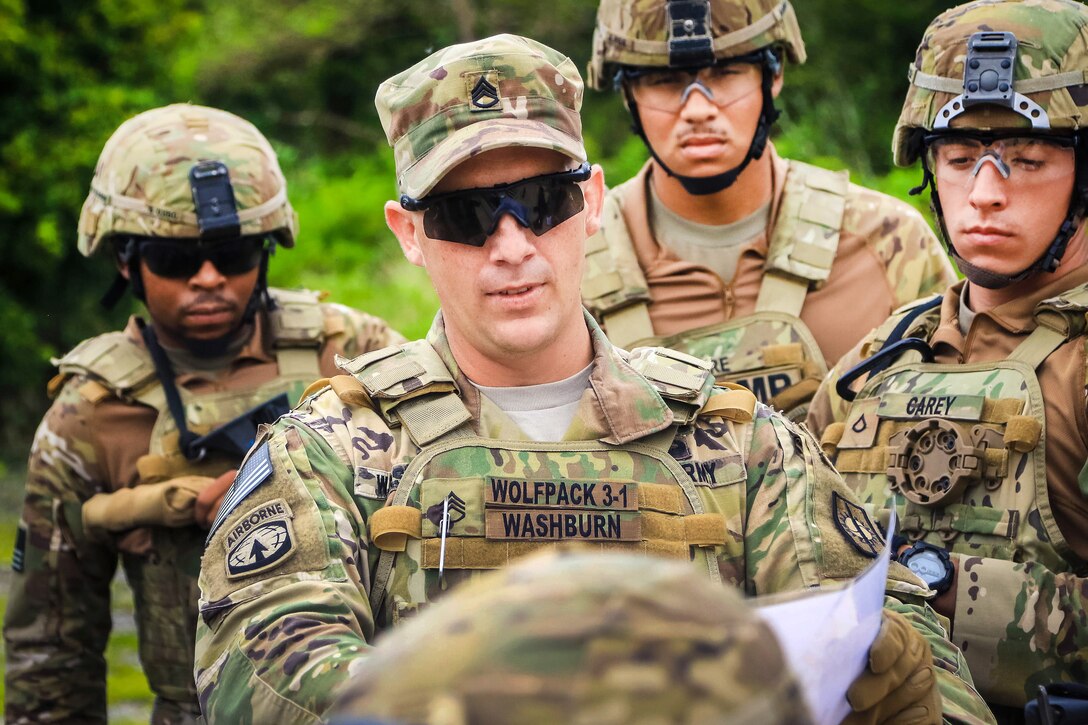 A soldier conducts a mission and safety brief before participating in a vehicle mounted patrol training exercise.