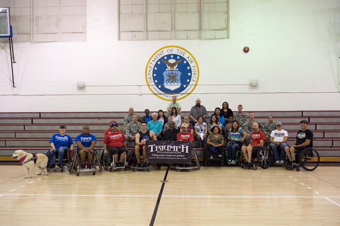 Edwards AFB Airmen participate in a wheelchair rugby game with Triumph Foundation members at the base gym Oct. 24. The event was put on in recognition of National Disability Employment Awareness Month. (U.S. Air Force photo by Kyle Larson)