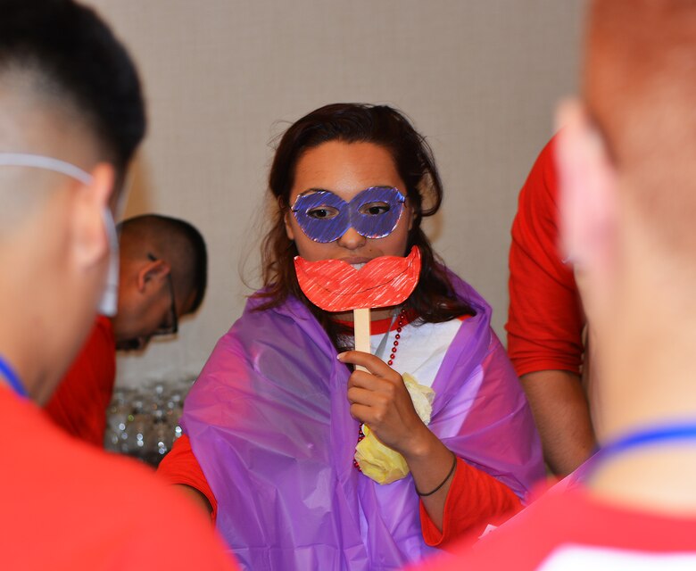 Victoria Guilloty, a mechanical engineer with the U.S. Army Corps of Engineers Los Angeles District, acts as a villain in one of three skits during the Hispanic Engineer National Achievement Awards Conference College Bowl Oct. 20 in Pasadena. Guilloty was a coach for the Corps' team at the event. Great Minds in STEM's annual HENAAC Conference is the organization's flagship event to celebrate Hispanic excellence in STEM. The Corps is one of the many agencies and organizations that sponsor a team at the event.
