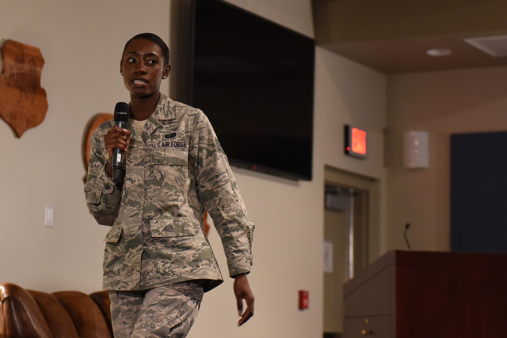 Staff Sgt. Janai, 42nd Attack Squadron commander’s support staff NCO in charge, explains how she reacted to and coped with the loss of her brother during a Storytellers event in the Creech auditorium, October 18, 2017. Janai later explained she didn’t share her story with her mother prior to this event. (U.S. Air Force photo/Airman 1st Class Haley Stevens)
