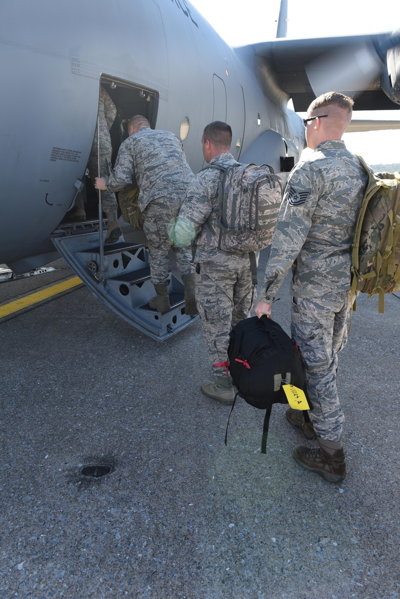 201st RED HORSE Squadron Airmen, from Ft. Indiantown Gap, Annville, Pennsylvania, board a 109th Airlift Wing, LC-130H Hercules aircraft, at Middletown, Pennsylvania, on their way to St. Croix, U.S. Virgin Islands, Oct. 25, 2017. They will maintain the tents and various equipment used in the Disaster Relief Bed-down System for responders, in support of Hurricane Maria's relief and rebuilding efforts.  (U.S. Air National Guard photo by Master Sgt. Matt Schwartz/Released)