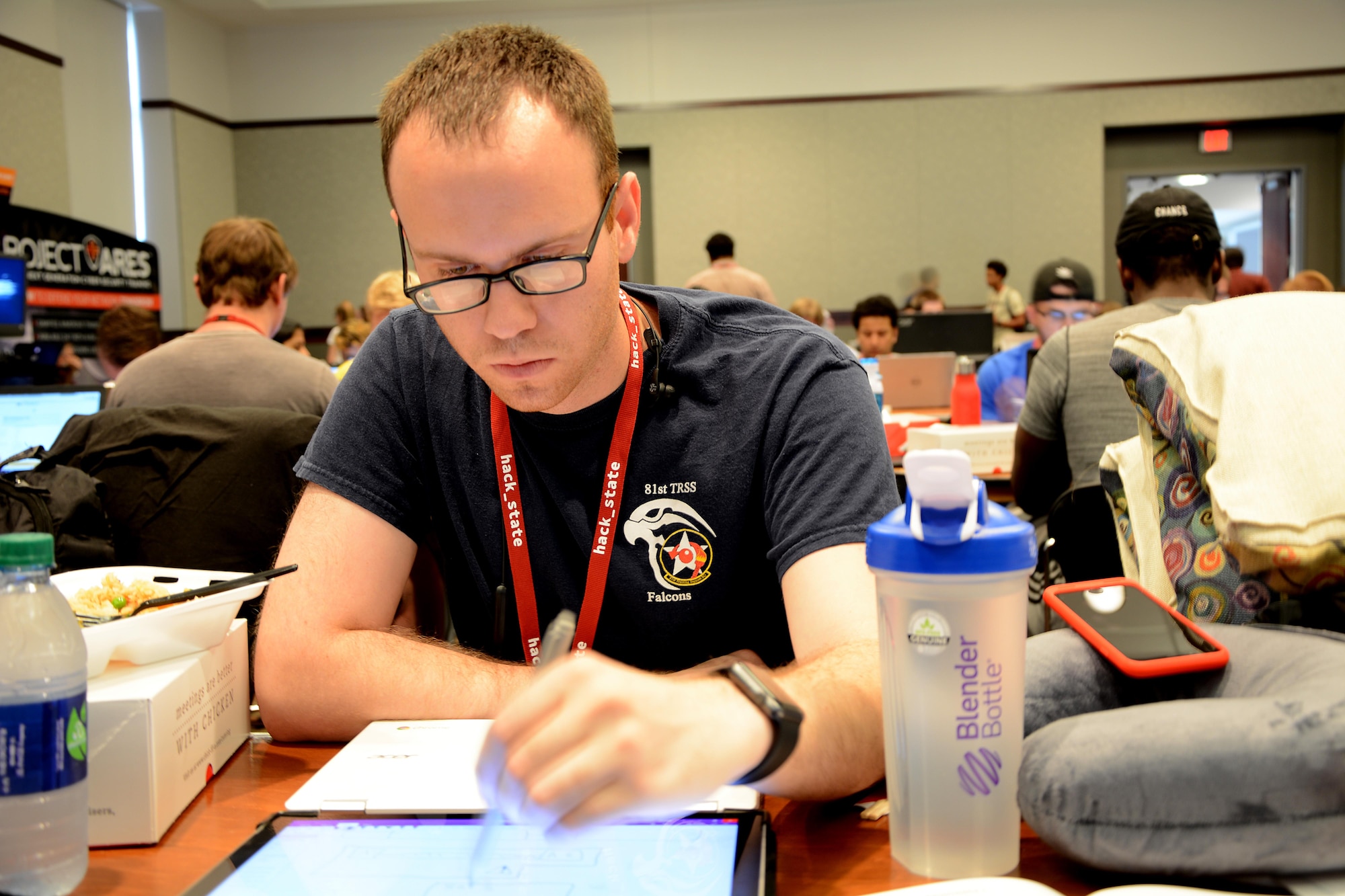 Staff Sgt. Christopher Pineda, 81st Training Support Squadron interactive media developer, programs a safety hack Sept. 23, 2017, during HackState at Mississippi State University in Starkville, Mississippi. The Keesler team participated in a hackathon and won the best safety hack, which was created in 24 hours, for Industrial Paper. (Courtesy photo)