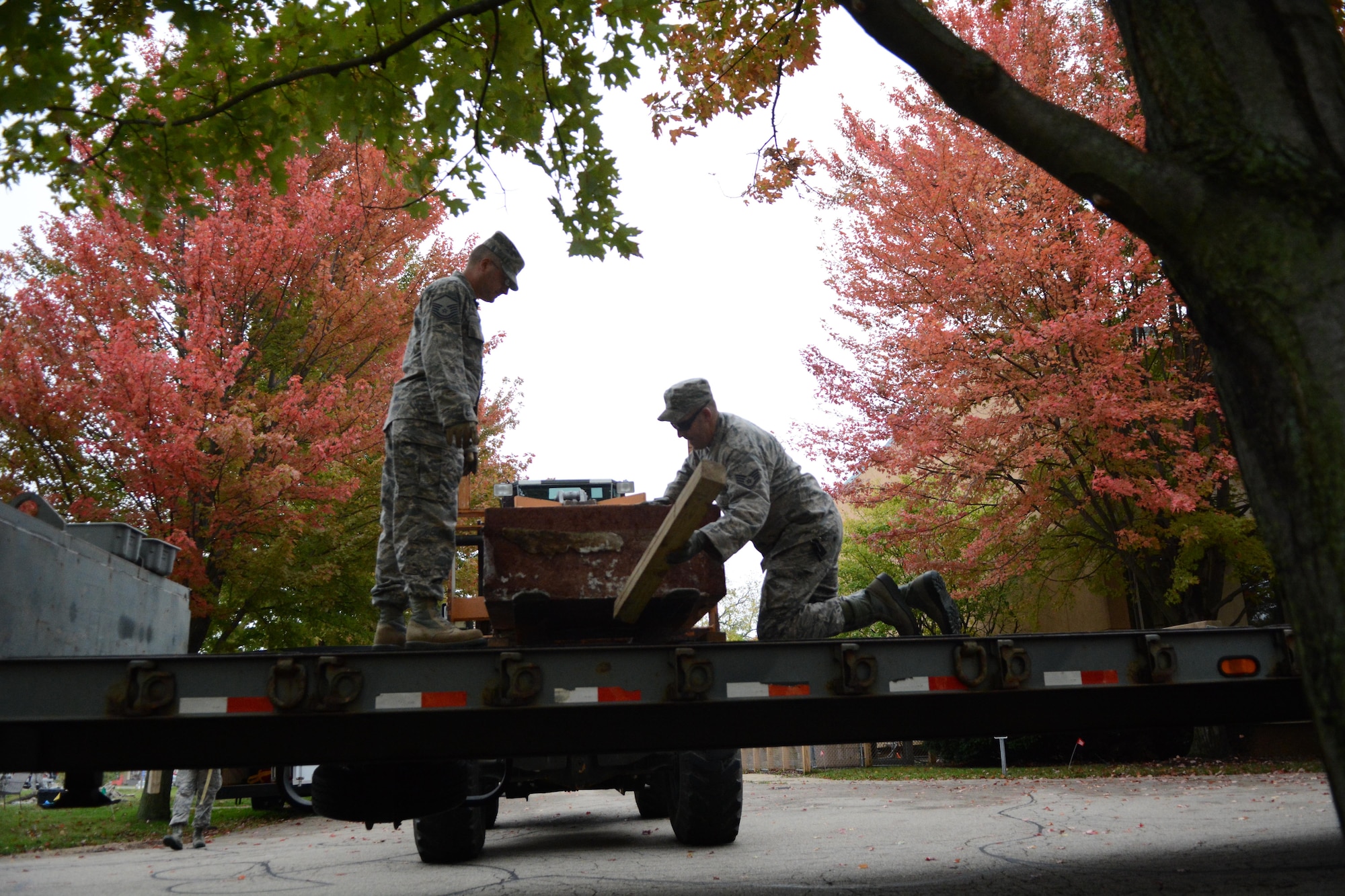 A monument dedicated to the farm youth of Wisconsin who have served their country in the defense of freedom, found a new resting place with help from the Airmen of the 115th Fighter Wing Civil Engineering Squadron and Urban Search and Rescue team based out of Truax Field, Madison, Wisconsin. The 18 Airmen invested approximately 60-75 hours into the movement Oct. 14, with many more hours invested behind the scenes with planning and coordination between the 115th FW’s CES, Fire and Emergency Services Flight, and USAR team along with the Wisconsin Department of Agriculture, Trade and Consumer Protection, and Wisconsin Department of Administration – Bureau of Real Estate Management.