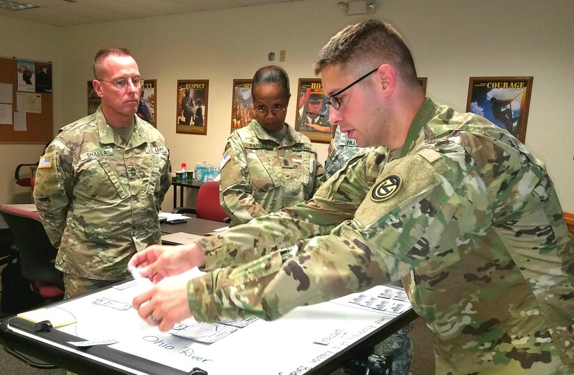 (Far right) Sgt. 1st Class Colby Peterson, an instructor assigned to the 102nd Training Division, teaches a class on building ribbon bridge rafts at the 80th Training Command 2017 Instructor of the Year competition held at Fort Knox, Kentucky, Oct. 20, 2017.