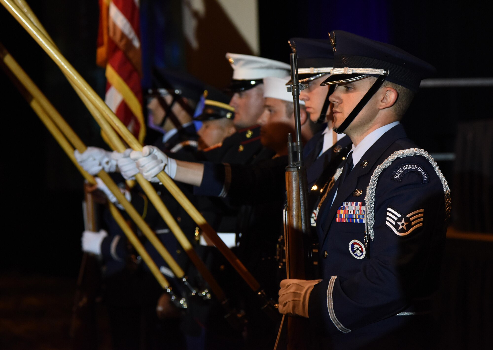 U.S. Air Force Staff Sgt. Luke Phillips, Keesler Honor Guard, participates in presenting the colors during the 39th Annual Salute to the Military at the Mississippi Coast Convention Center, Oct. 24, 2017, Biloxi, Mississippi. The Salute to the Military event recognized the men and women who serve in the military along the Gulf Coast. (U.S. Air Force photo by Kemberly Groue)