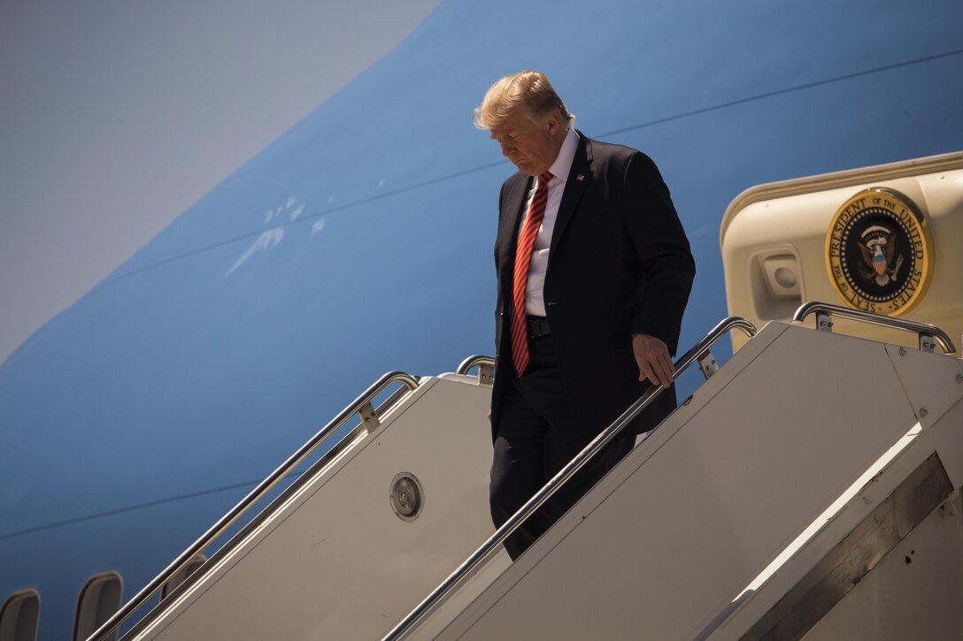 U.S. President Donald J. Trump debarks Air Force One on the Marine Corps Air Station (MCAS) Yuma, Ariz., flightline Aug. 22, 2017. President Trump visited MCAS Yuma to interact with Marines, Sailors and their families on station. (U.S. Marine Corps photo taken by Lance Cpl. Christian Cachola)
