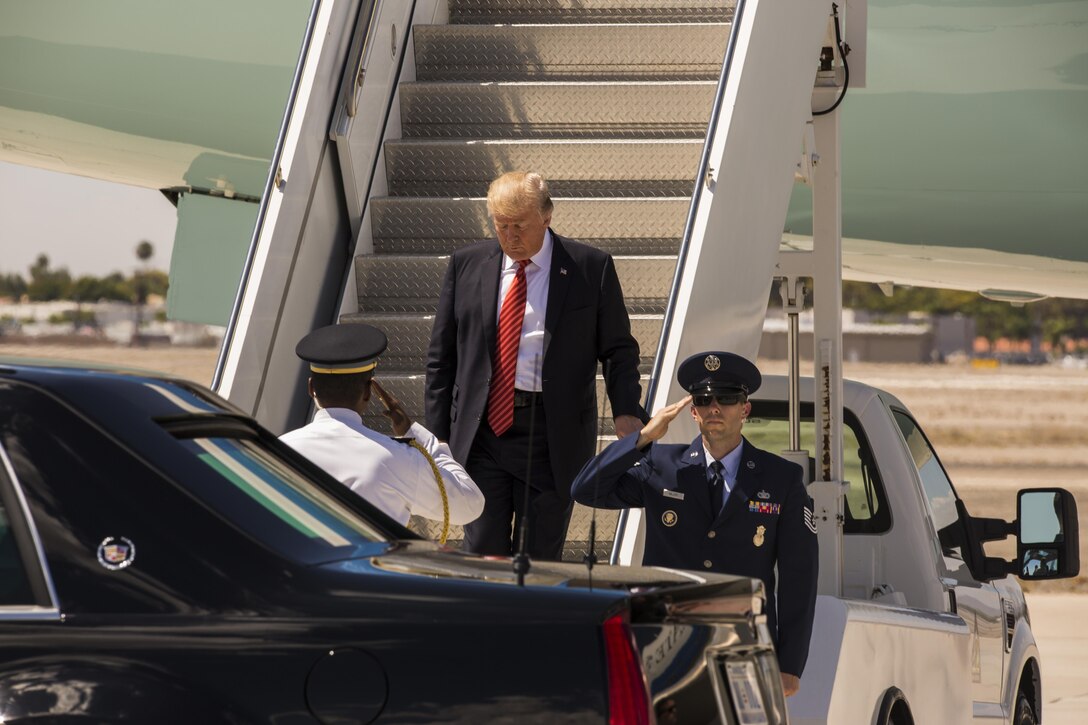 U.S. President Donald J. Trump debarks Air Force One aboard Marine Corps Air Station (MCAS) Yuma, Ariz., Aug. 22, 2017. President Trump visited MCAS Yuma to interact with Marines, Sailors and their families on station. (U.S. Marine Corps photo taken by Lance Cpl. Isaac D. Martinez)