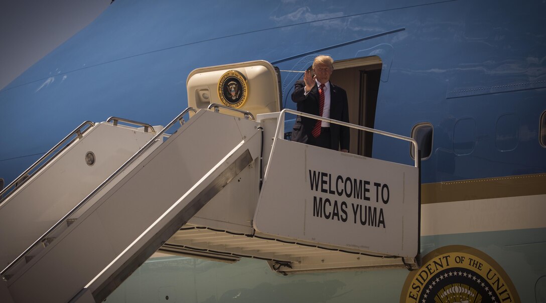 U.S. President Donald J. Trump waves to the troops and family members at Marine Corps Air Station (MCAS) Yuma, Ariz., Aug. 22, 2017. President Trump visited MCAS Yuma to interact with Marines, Sailors and their families on station. (U.S. Marine Corps photo taken by Lance Cpl. Christian Cachola)