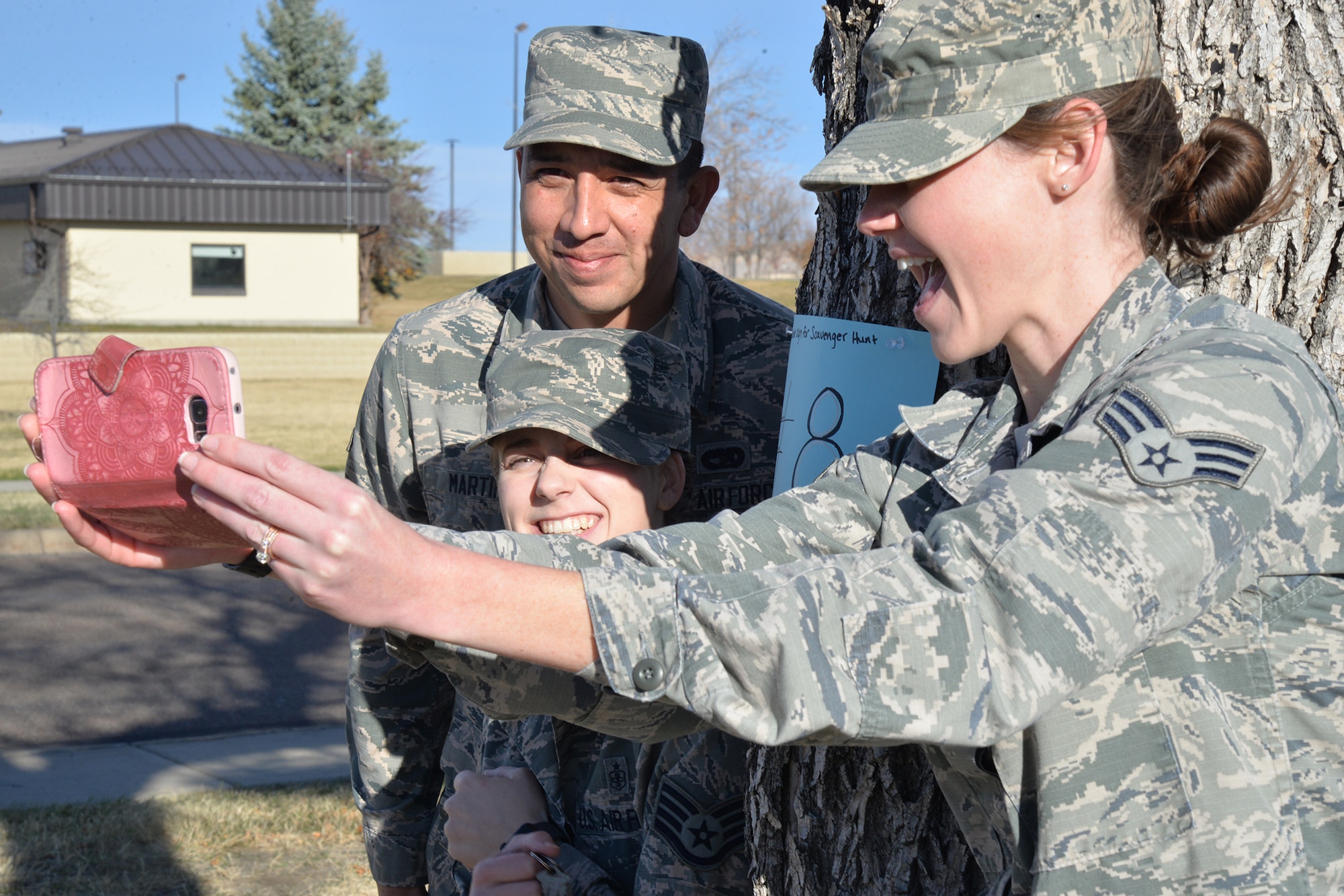 A team of Airmen pose for a selfie at one of the nine clues during an Energy Action Month scavenger hunt Oct. 25, 2017, at Malmstrom Air Force Base, Mont.