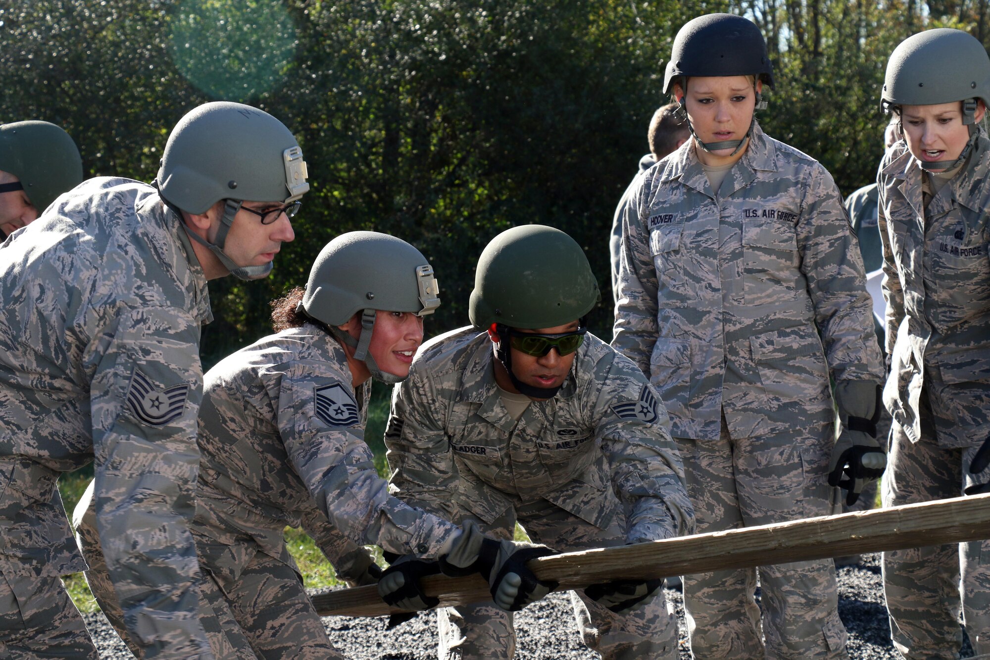 Production Recruiter and Retention Airmen navigate obstacles on a Leadership Reaction Course at Fort Indiantown Gap, Pennsylvania, Oct. 17, 2017. The PRR Airmen are part of Strength Management Teams from the three Air National Guard Wings in the Commonwealth; whom came together during a week-long Pennsylvania Air National Guard Fall Leadership Forum.  (U.S. Air National Guard photo by Master Sgt. Culeen Shaffer/Released)