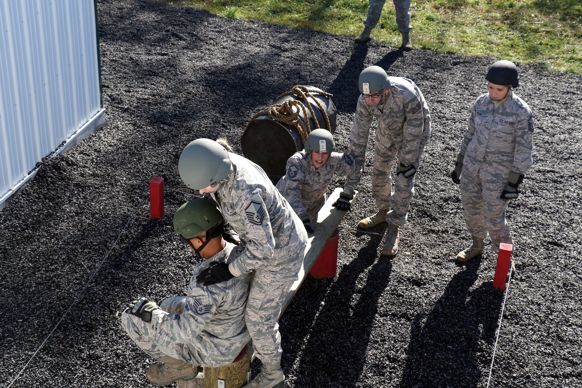 Production Recruiter and Retention Airmen navigate obstacles on a Leadership Reaction Course at Fort Indiantown Gap, Pennsylvania, Oct. 17, 2017. The PRR Airmen are part of Strength Management Teams from the three Air National Guard Wings in the Commonwealth; whom came together during a week-long Pennsylvania Air National Guard Fall Leadership Forum.  (U.S. Air National Guard photo by Master Sgt. Culeen Shaffer/Released)
