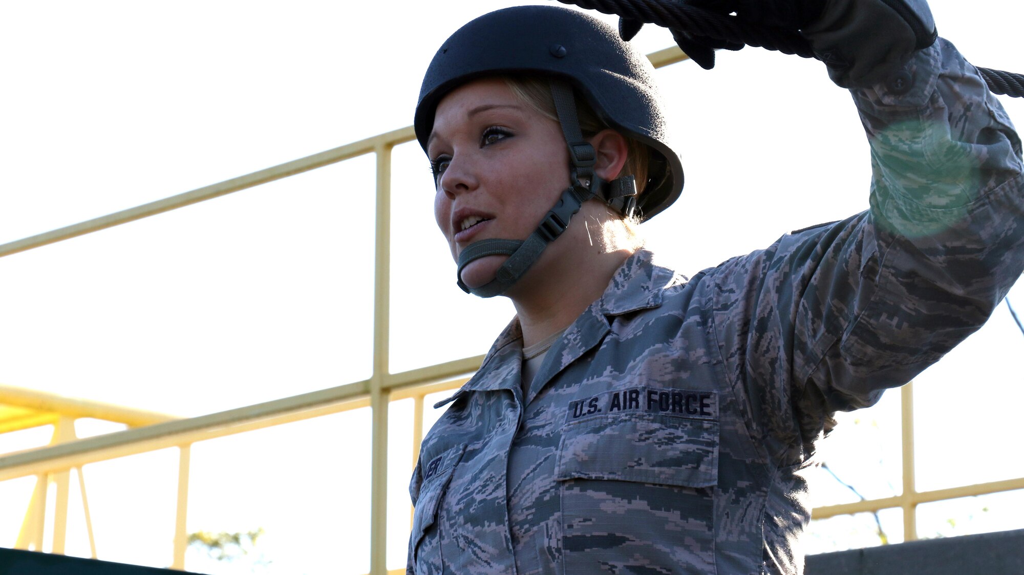 Master Sgt. Meghan Hoover, 193rd Special Operations Wing Production Recruiter and Retention Manager looks across an obstacle at her team on a Leadership Reaction Course at Fort Indiantown Gap, Pennsylvania, Oct. 17, 2017. The PRR Airmen are part of Strength Management Teams from the three Air National Guard Wings in the Commonwealth; whom came together during a week-long Pennsylvania Air National Guard Fall Leadership Forum.  (U.S. Air National Guard photo by Master Sgt. Culeen Shaffer/Released)