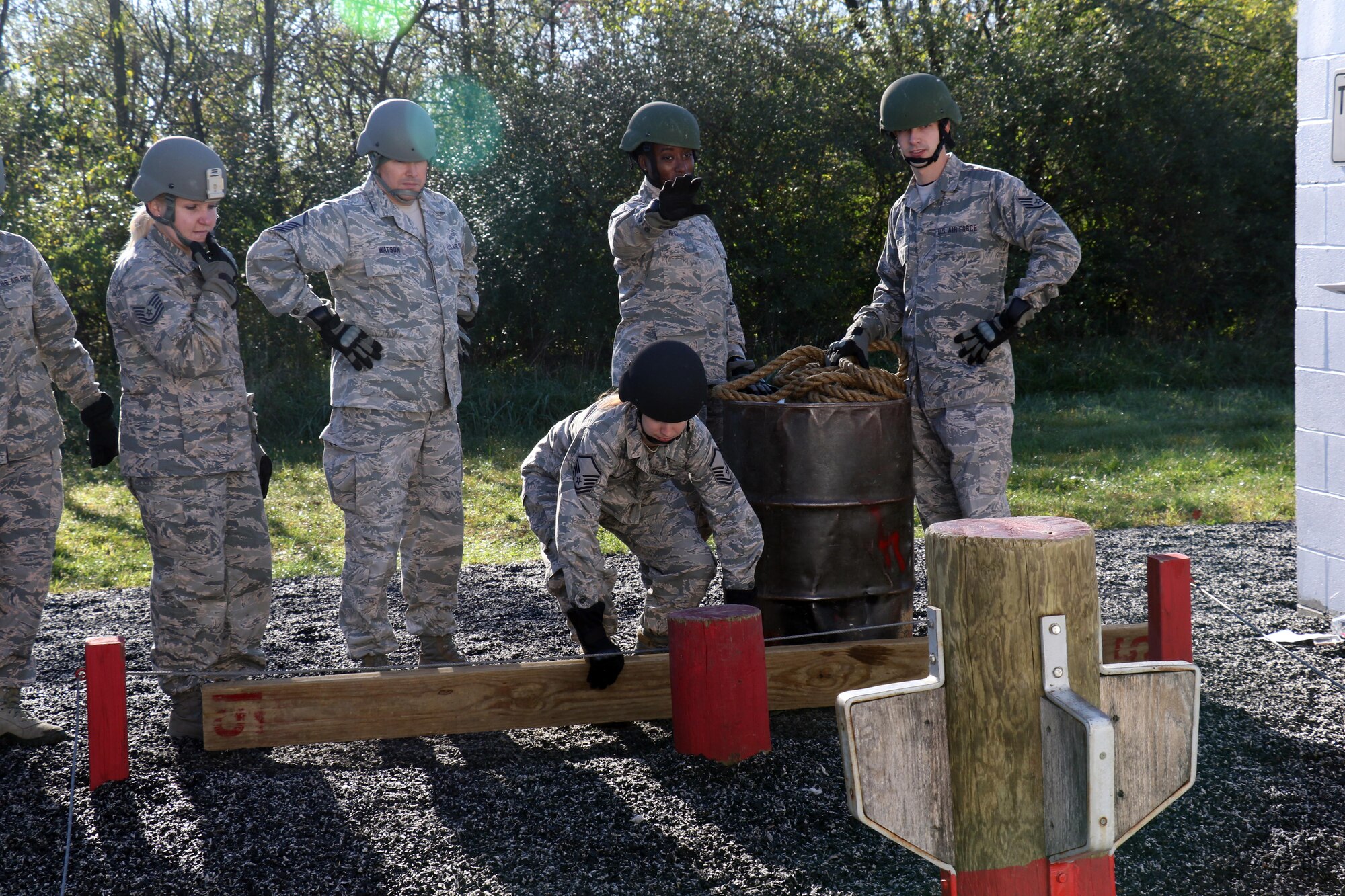 Production Recruiter and Retention Airmen navigate obstacles on a Leadership Reaction Course at Fort Indiantown Gap, Pennsylvania, Oct. 17, 2017. The PRR Airmen are part of Strength Management Teams from the three Air National Guard Wings in the Commonwealth; whom came together during a week-long Pennsylvania Air National Guard Fall Leadership Forum.  (U.S. Air National Guard photo by Master Sgt. Culeen Shaffer/Released)