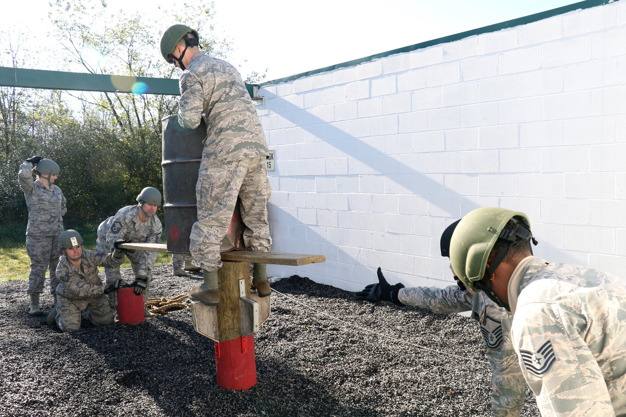 Production Recruiter and Retention Airmen navigate obstacles on a Leadership Reaction Course at Fort Indiantown Gap, Pennsylvania, Oct. 17, 2017. The PRR Airmen are part of Strength Management Teams from the three Air National Guard Wings in the Commonwealth; whom came together during a week-long Pennsylvania Air National Guard Fall Leadership Forum.  (U.S. Air National Guard photo by Master Sgt. Culeen Shaffer/Released)