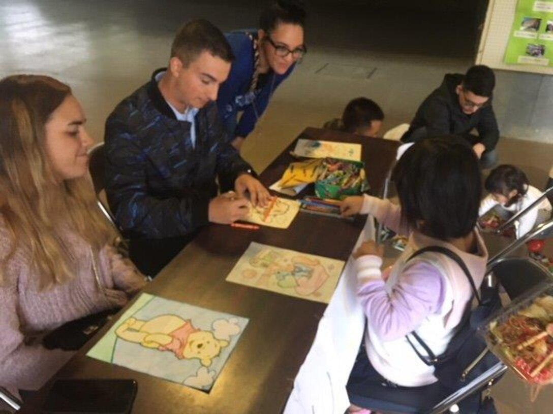 "On Friday 13 October and Saturday 14 October, our Marines helped as volunteers for the Open House festival organized by the National Chuo Youth Friendship Center, just across the road from us.  Our first ever joint summer English Camp back in late August was a great success, and this Open House has also followed suit to be another community relations program which enhanced our mutually supportive relationship between Camp Fuji Marines and our local communities.  Our Marines volunteered to help the Youth Center set up for the event on Friday, the day before the Open House weekend,  by transporting wooden tables down from the camp site to the main stage area.  Special thanks to all CATC, 18, 171 Marines who volunteered over the two days".