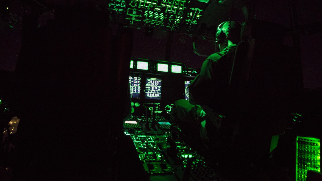 U.S. Marine Corps pilots with Marine Aerial Refueler Transport Squadron (VMGR) 152 based out of Marine Corps Air Station (MCAS) Iwakuni, Japan, pilot a KC-130J Hercules during a nighttime aerial refueling training operation Oct. 25, 2017. The training consisted of refueling the air station’s F-35B Lightning II aircraft with Marine Fighter Attack Squadron (VMFA) 121 and F/A-18C Hornets with VMFA-251 based out of MCAS Iwakuni. This training was conducted at night to improve operational readiness and enhance pilot proficiency.