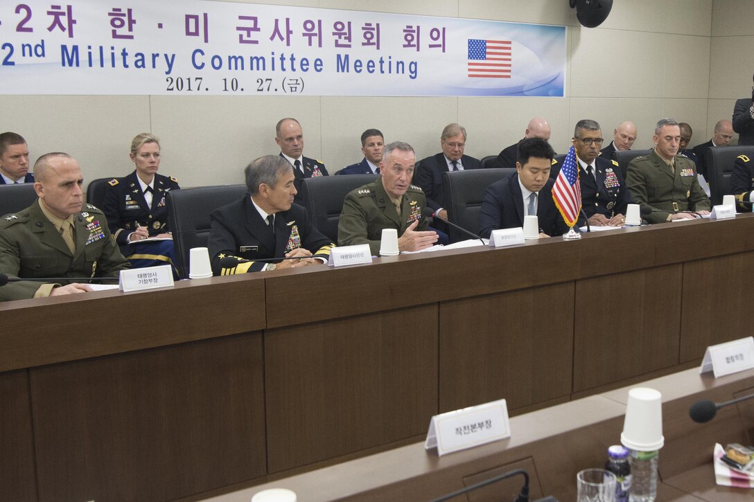 Gen. Joe Dunford sits in a room with other military leaders from the U.S. and South Korea.