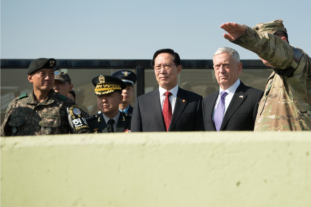 U.S. and South Korean defense leaders look out over the Demilitarized Zone.