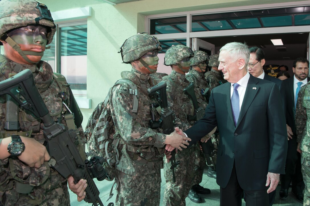 U.S. and South Korean defense leaders greet troops at the Demilitarized Zone.