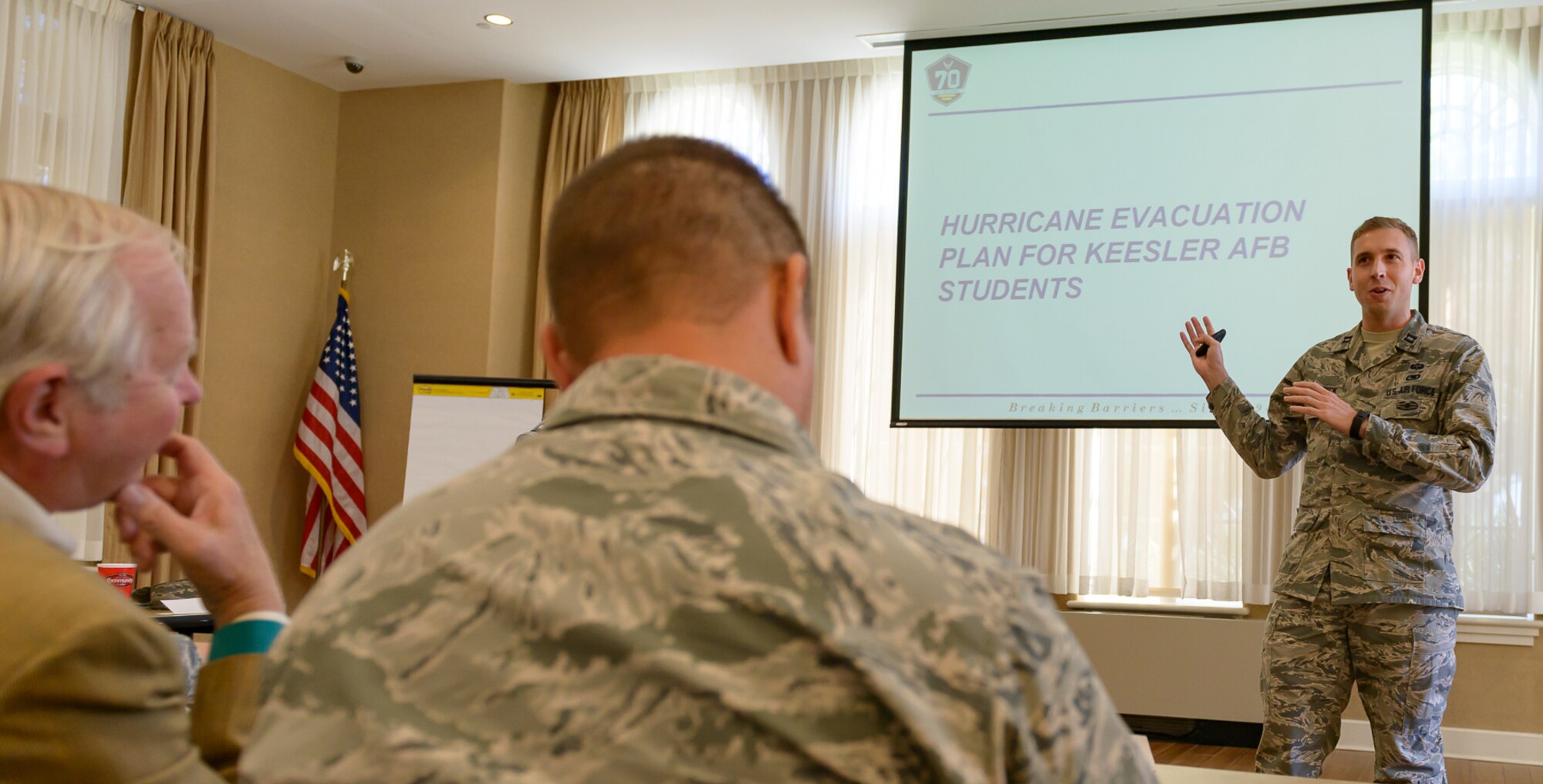 Capt. Keith Van Dyck, 81st Logistical Readiness Squadron director of operations, discusses Keesler’s student hurricane evacuation plan with Keesler and community leaders during the Air Force Community Partnership Program Agreements Workshop at the Gulf Park Campus of The University of Southern Mississippi Oct. 25, 2017, Long Beach, Mississippi. The program is part of a larger Air Force Public-Public, Public-Private (P4) initiative to encourage installations and local communities to combine or improve resources or operating processes. Mississippi representatives from state and local communities and various civic leaders attended the event. (U.S. Air Force photo by Andre’ Askew)